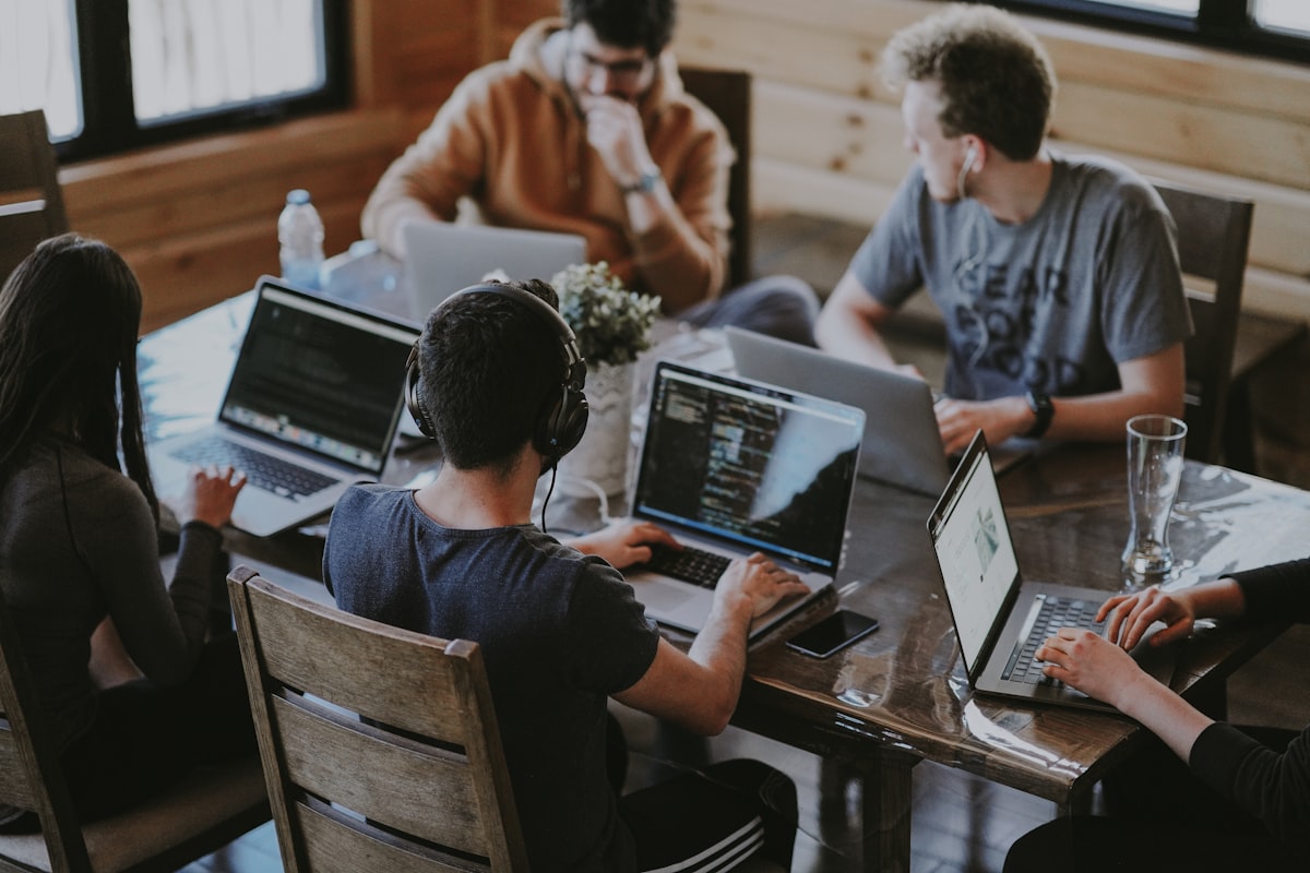 Remote workers collaborating in a modern co-working space